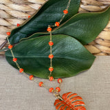 TRISH BECKER - Orange Tropical Leaf Necklace